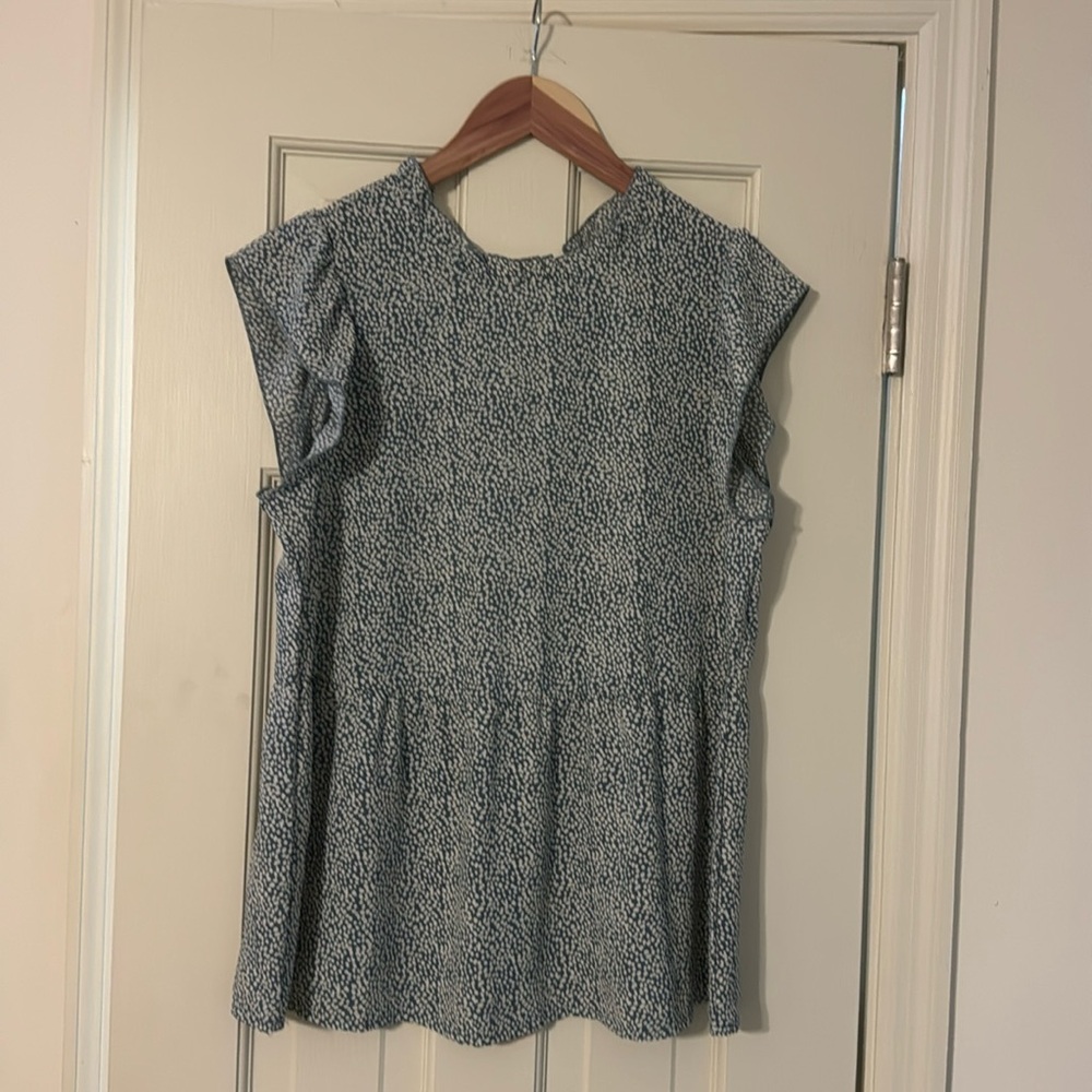 Pale blue and off-white baby doll top.
